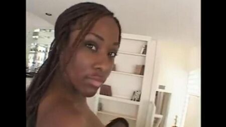 A dick penetrates into the vagina of a black woman