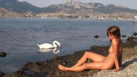 Naked on the riverbank