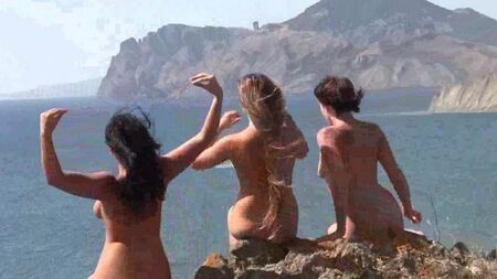 Naked friends on the beach