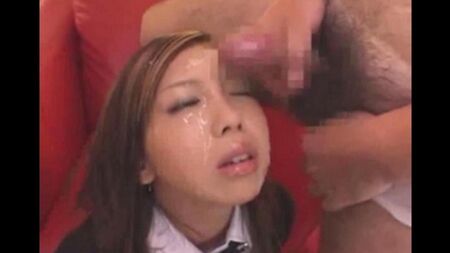 Sperm drenched in the Chinese woman smiles and at the same time groans