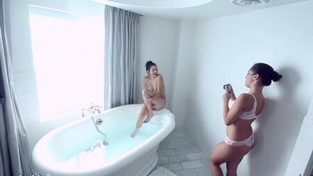 Lesbians jointly take a bath