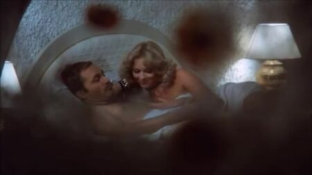 Sybil Danning as Brenda in a scene from The Day of the Cobra (1980)...