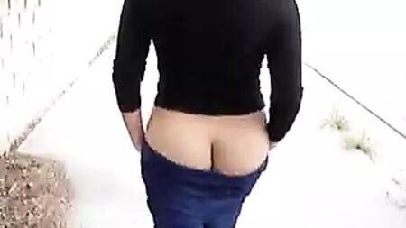 Vanity walking nude on the street.