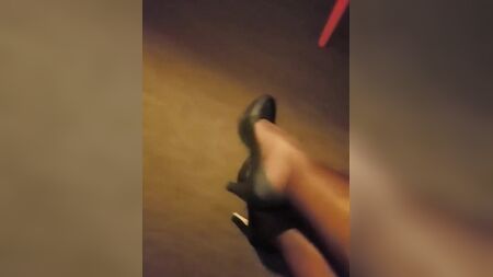 flight attendant dangling with high heels and pantyhose