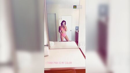 Ashley Tisdale sexy mirror selfie in a pink bikini