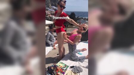 Mae Whitman rubbing Jane Levy's butt