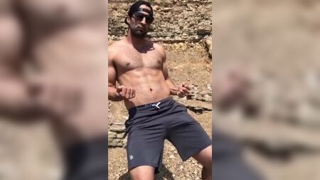 Sexy guy with huge bulge in shorts