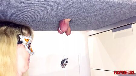 Mistress ties heavy objects to balls on the milking table