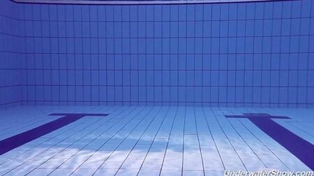Helen undressed and swims in the pool naked