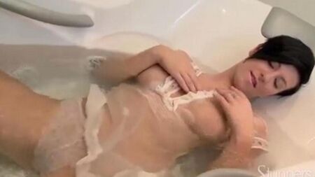 Lonely brunette masturbates shower