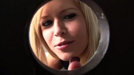 Blonde sucks a member through a hole in the toilet