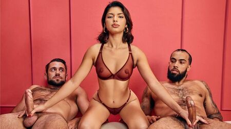 Their hands work in sync, and the guys moan in unison