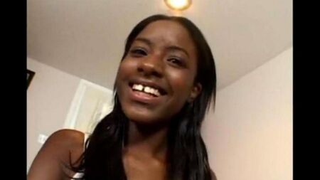 A young black woman tears white