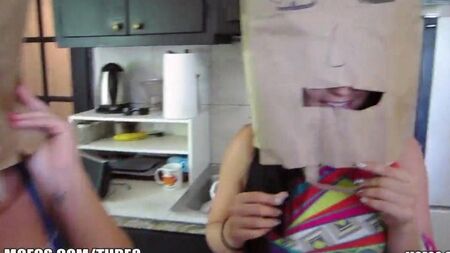Put on the girls bags on their heads