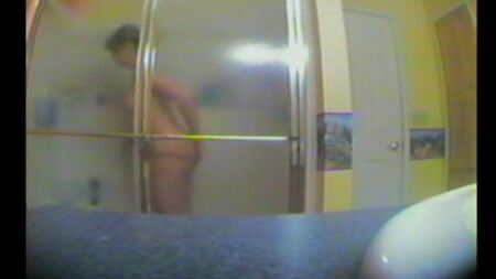 Sister takes a shower, not knowing about the hidden cell