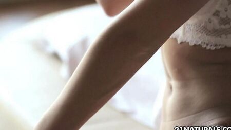 Gorgeous blonde is engaged in masturbation