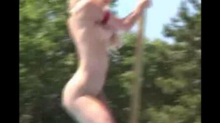 Naked in public performs striptease