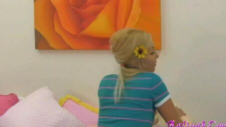Blonde in rubs a pussy on a soft toy