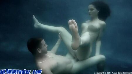 Sex underwater with a beautiful brunette