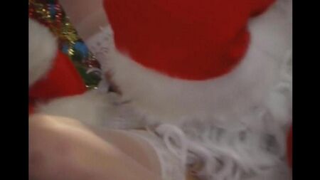 Santa Claus fucked a sexy Snow Maiden in stockings under a Christmas tree
