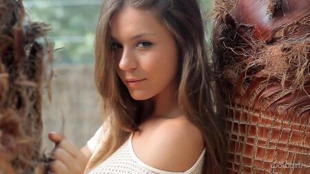 Young Russian beauty performs striptease
