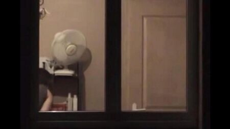 Admires to himself in the mirror standing in front of him completely naked