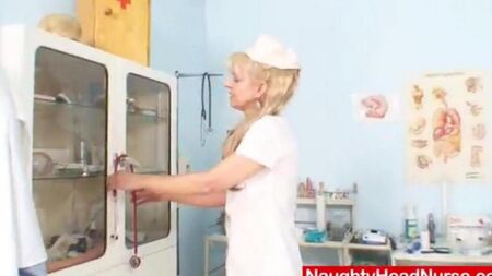 Mature nurse fucks herself
