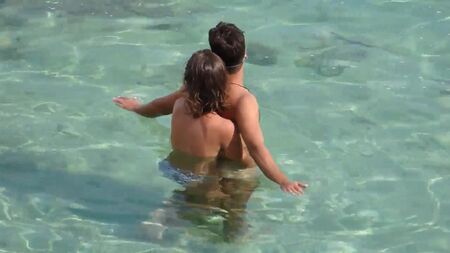 Girl fingering a guy at sea underwater