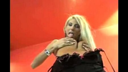 Hot blonde dancing striptease