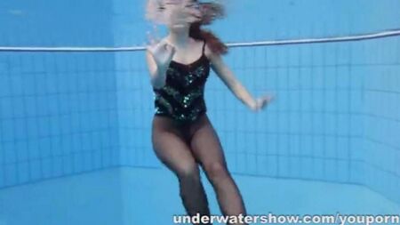 Naked woman in the pool