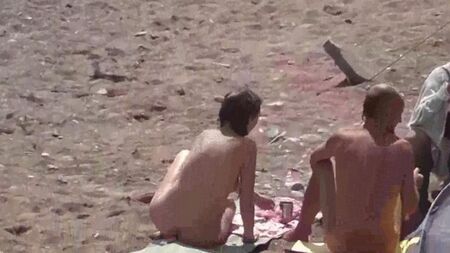 Naked girls bathing in the sea